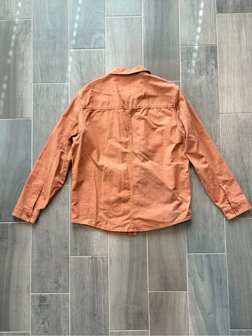 Prana button front
